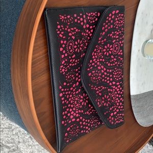 Large neon cutout clutch